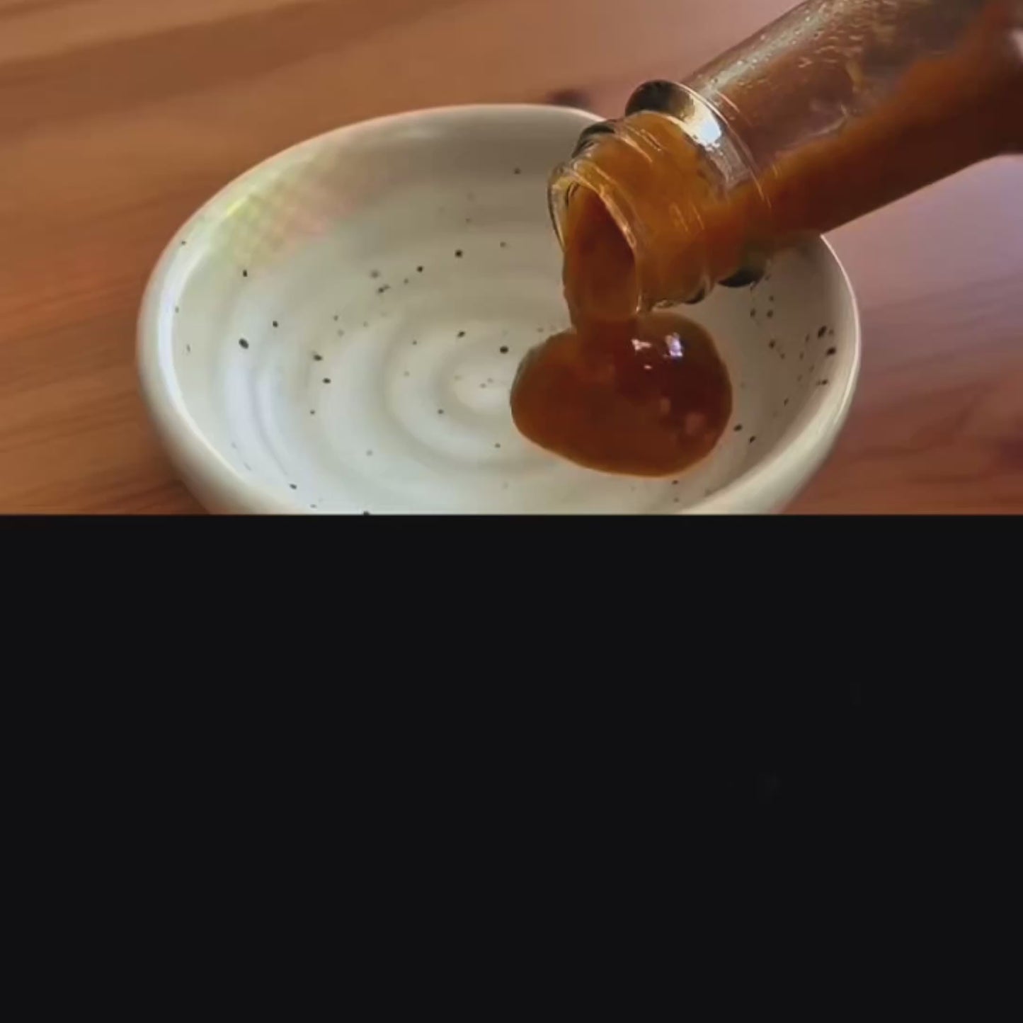 sauce daddy hot sauce being poured on toast and tacos