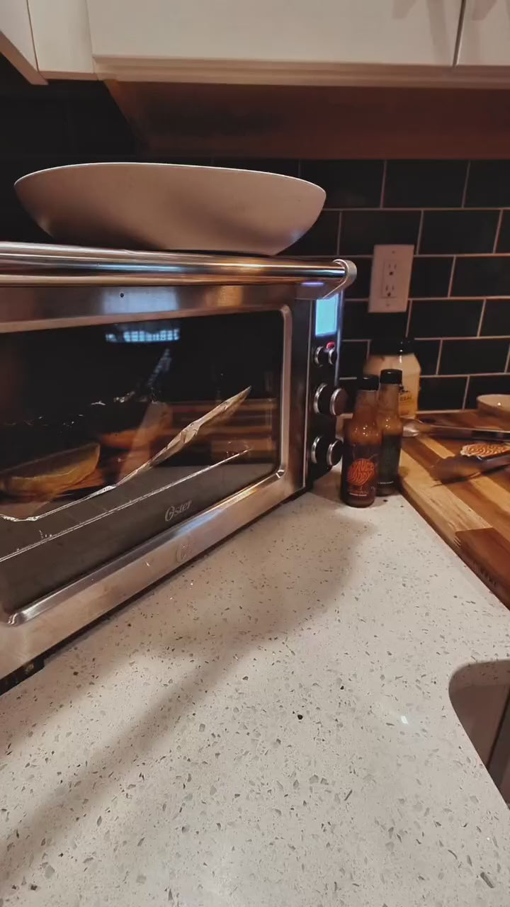 delicious hot sauce poured on a burger